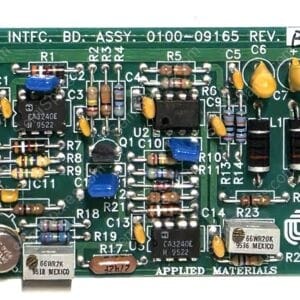 Green printed circuit board densely populated with resistors, capacitors, inductors, and ICs labeled U1, U2, R1–R23, used in electronic hardware; Applied Materials branding visible at bottom center.