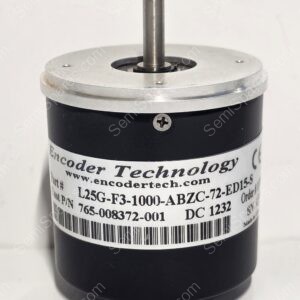 Close-up of an encoder with a metal shaft protruding from a black cylindrical housing and a barcode label nearby on the side of the device.