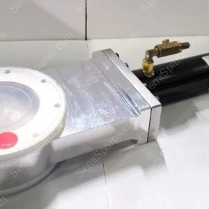 Industrial actuator assembly with a silver rectangular housing and a black cylindrical component with brass fittings, on a white surface.