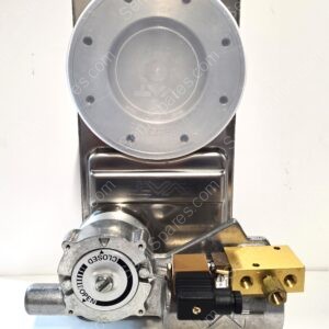 Industrial valve with a round, gray control dial showing OPEN and CLOSED markings, brass fittings, and a warning label in German (Achtung).