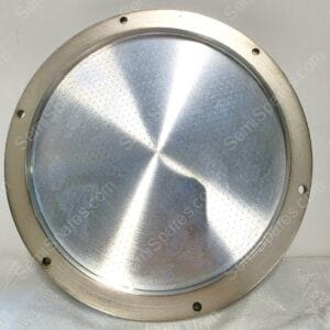 Close-up of a perforated stainless-steel drum inside a circular metal frame with small screws around the edge.