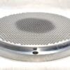 Close-up of a stainless steel circular vent cover with evenly spaced small round holes (perforated metal grille).