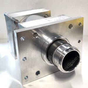 Close-up of a metal machine block with a cylindrical bearing and exposed roller/mechanism pieces on a brushed aluminum frame.