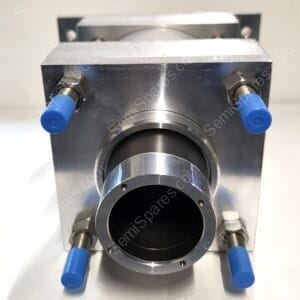 Close-up of a metallic manifold with a circular opening and blue hose connections on both sides.