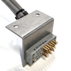 Metal connector block with gold pins protruding from a gray base, and mounting holes visible on a textured metal surface