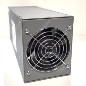 Close-up of a gray metal electrical enclosure with a circular, chrome fan grill and four visible screws securing the panel.