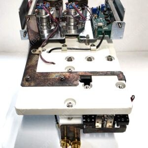Mechanical assembly with two rotary actuators, wiring, and a green circuit board mounted on a metal frame.