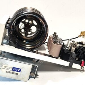 Large circular black coil mounted on a metal frame with electrical terminals and wires