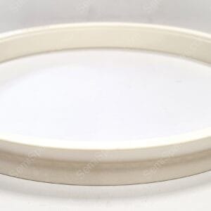 Close-up of a white circular dish with a thick rim, viewed from above.