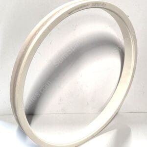 White circular plastic ring set on a white surface with faint small text along the inner edge (indented label).