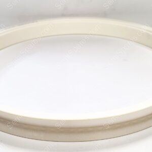 Close-up of a white circular plastic lid with an inner groove viewed from above.