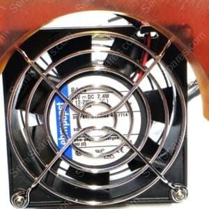 Close-up of a chrome circular fan inside a black housing with a protective wire grille.