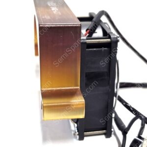 Side view of a wooden block mounted to a black metal mechanism with a visible screw rod and wires in the background.