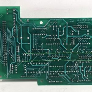 Green printed circuit board with numerous silver solder joints and intricate trace routes visible from the back side, showing edge connectors on left.
