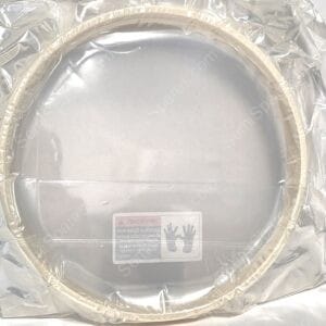 Top view of an aluminum tray sealed with plastic wrap along the rim, with a safety label visible on the inner surfaceide at the bottom edge