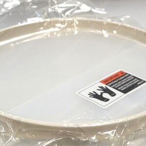 Round aluminum pan wrapped in clear plastic, with an 'IMPORTANT' warning label visible inside the rim.