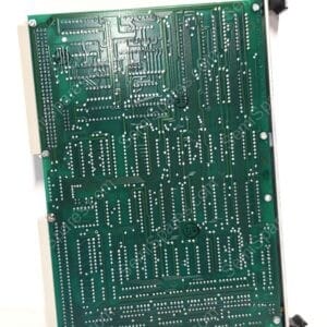 Back side of a green printed circuit board with numerous silver solder joints and intricate copper traces mounted in a metal rack.] , but please fix