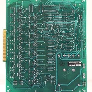 Bottom-side view of a green printed circuit board with intricate silver solder joints and traced pathways near a gold edge connector edge edge.