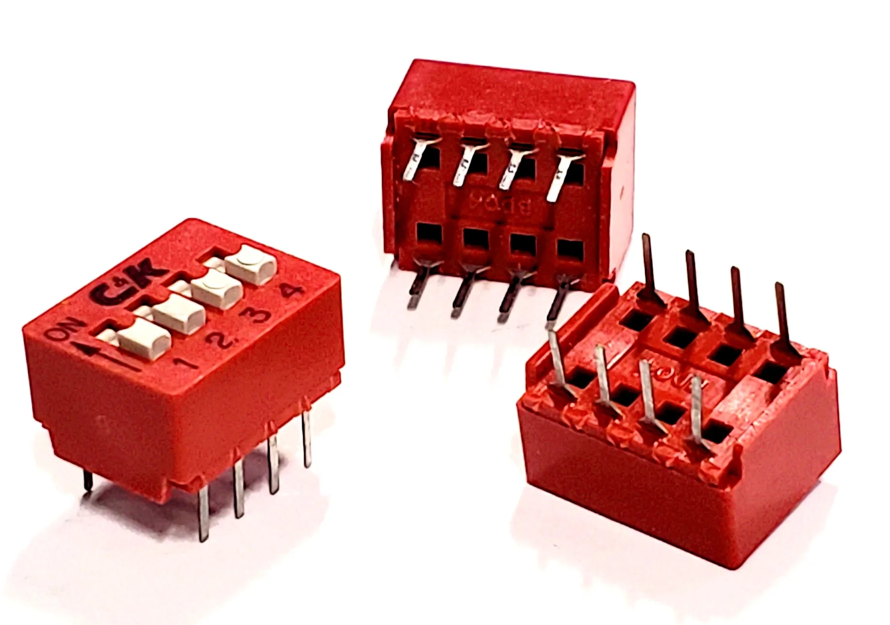 BD04 | DIP SWITCH SPST 4 POSITION THROUGH HOLE SLIDE ACTUATOR 100MA 5VDC RAISED PC PIN - Image 4