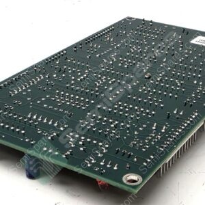 Green PCB densely populated with through-hole pins and an edge connector, viewed at an angle.