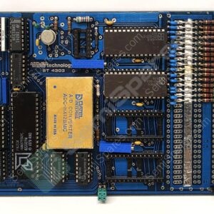 Blue vintage computer motherboard with multiple integrated circuits, resistors, and edge connectors, viewed from above.