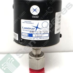 Industrial sensor housing with a white Laminar Technologies label, black cylindrical body, and a red bottom knob; mounted to a metal stem.