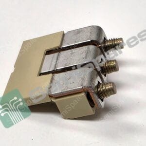 Close-up of a metal electrical terminal with threaded studs and clamp, resting on a beige component.