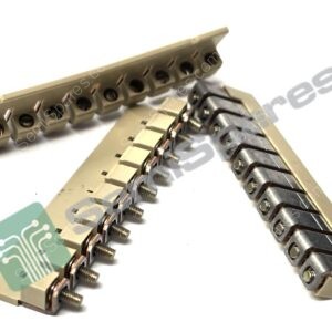 Close-up of beige Technic track links with metal bolts and a circuit board visible in the background on a white surface.