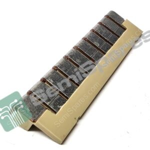 Close-up of a beige plastic strip with multiple parallel metal tabs along one edge, arranged diagonally across the frame.