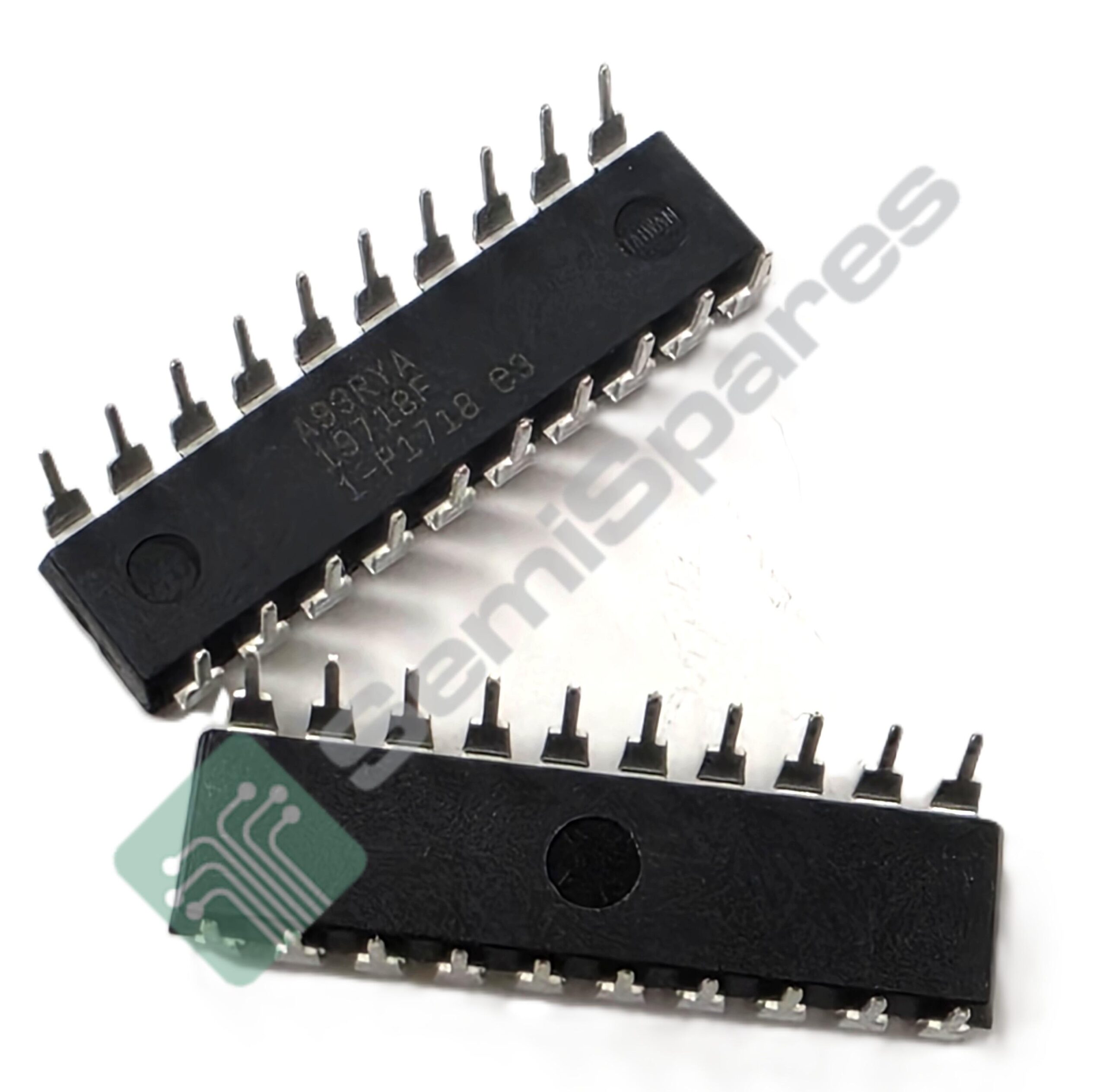 Close-up of a black DIP integrated circuit with metal pins along its sides.