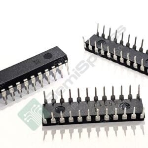 Two black DIP IC sockets with rows of metal pins on a white surface, empty sockets ready for ICs.