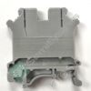 Close-up of a gray plastic electrical switch/contactor with 'Type UK10' stamped on the side.