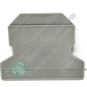 Close-up of a gray rectangular electronic module with a green circuit-pattern sticker and a visible Type label (partially readable).