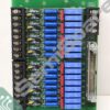 Green PCB populated with blue rectangular capacitors, resistors, and two black terminal blocks on sides; labeled GESICU-2A, XREF/XTRIG on right.