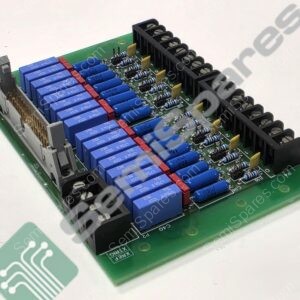Close-up of a green PCB showing blue capacitors, resistors, and black terminal blocks in a row.