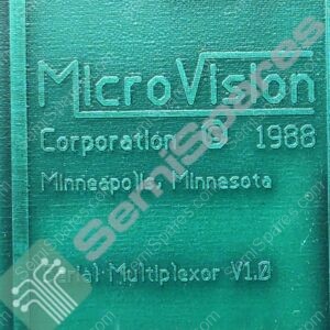 Close-up of a green plaque with raised lettering, showing the word Minnesota and partial accompanying text behind a watermark-like diagonal overlay.