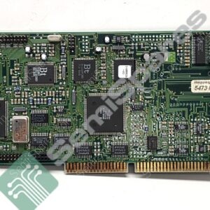 Green vintage computer circuit board with numerous ICs, capacitors, and a gold-edge connector along the bottom edge.