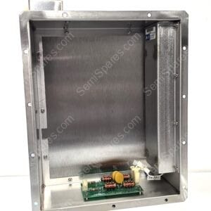 Interior of a metal electrical cabinet with a green PCB, resistors and capacitors mounted along the bottom inside the frame