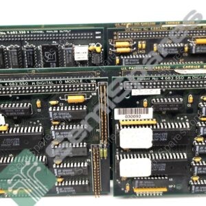 Close-up of stacked vintage printed circuit boards with DIP chips, yellow capacitors, and edge connectors used in old hardware