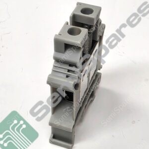 Close-up of gray plastic electrical connector with square holes and a metal spring inside.