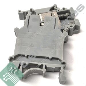 Close-up of a gray modular terminal block with a screw clamp for electrical wiring