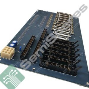 Close-up of a computer motherboard showing multiple expansion slots and gold connectors, photographed at an angle.