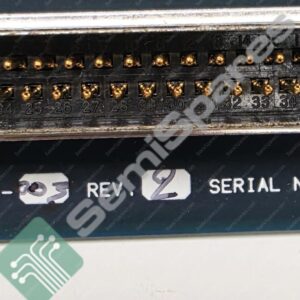 Close-up of a dense two-row D-sub connector with gold pins on a circuit board, with visible part numbers and serial BW1845163.
