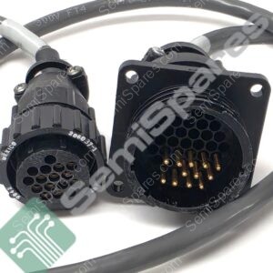 Close-up of two black circular multi-pin electrical connectors with gold pins and locking rings.