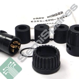 Close-up of black multi-pin electrical connector parts with gold contacts on a white background.,