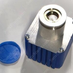 Close-up of a metal industrial valve with a perforated inner insert, mounted on a blue base with screws in view