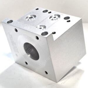 Metal aluminum block with multiple threaded holes and circular recessed pockets on the top surface (machining block).