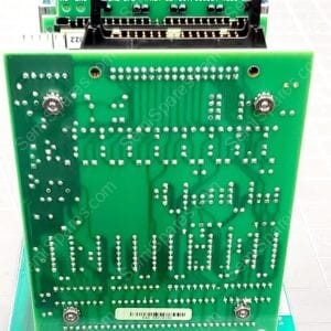 Green PCB module with dense solder joints, an edge connector, mounting holes, and a barcode label in an industrial electronics setup.
