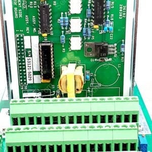 Industrial control PCB with screw-terminal blocks at the bottom, multiple ICs and connectors visible.