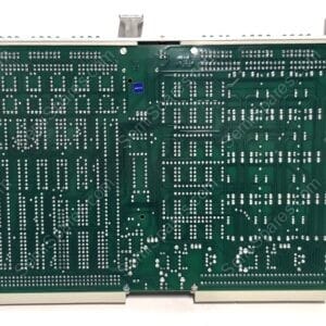 Green PCB with dense rows of solder joints, mounted in a metal frame (back side).